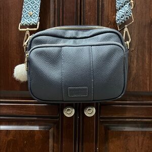 Pom Pom London crossbody bag in slate blue color